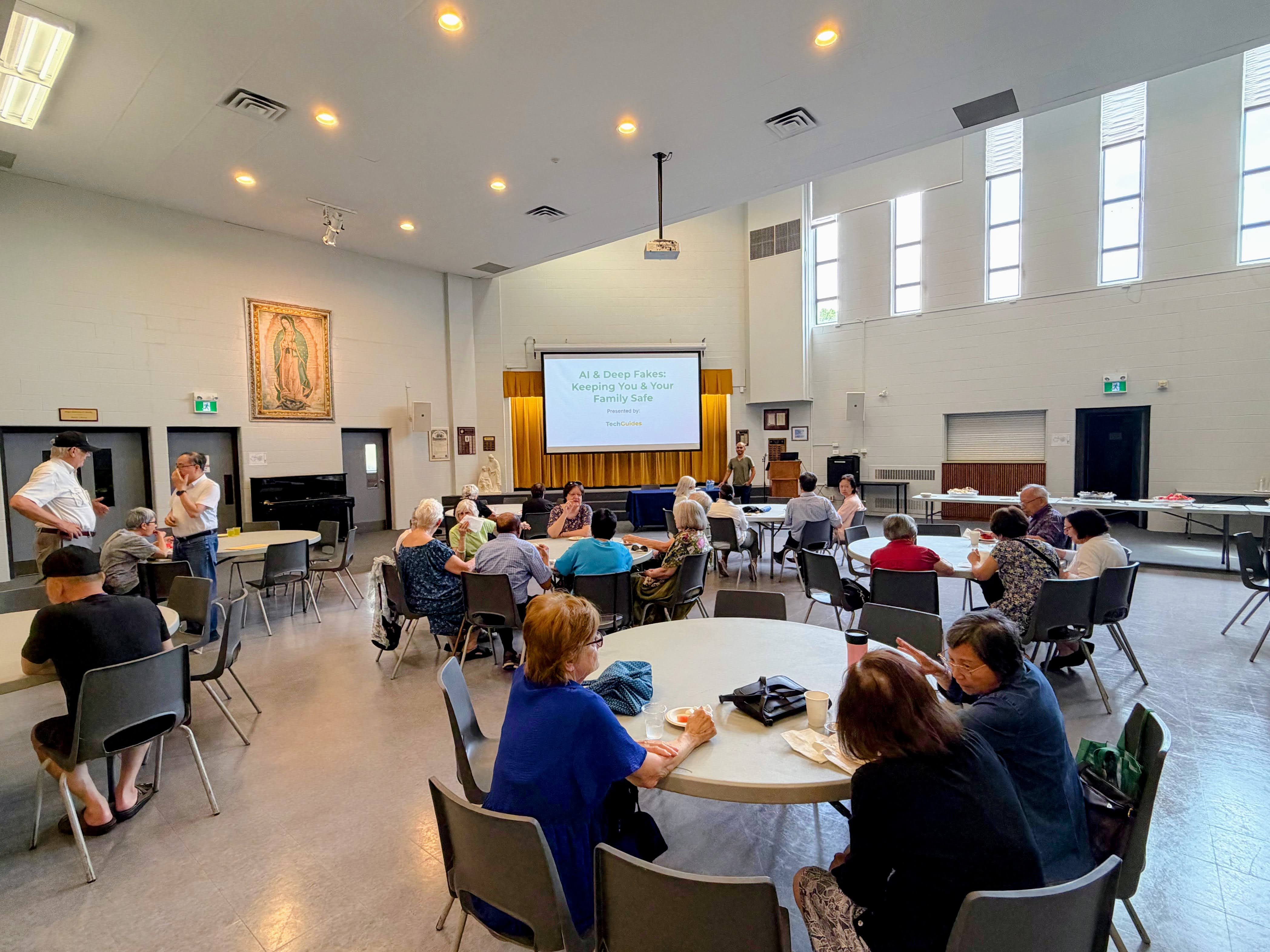 Over 75 attendees at a TechGuides AI and deepfakes safety session at Blessed Trinity Parish in North York